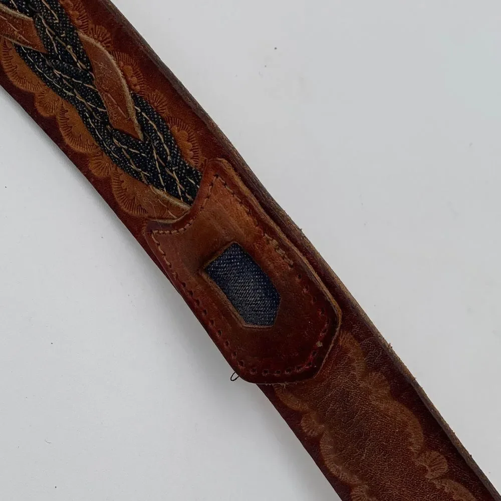 Brown Leather western style belt with braided leather and denim.